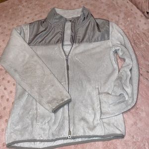 when it is washed do it with all whites and with a hit of bleach.
